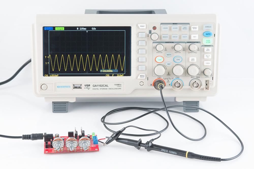 Oscilloscope Probe showing a waveform on the screen